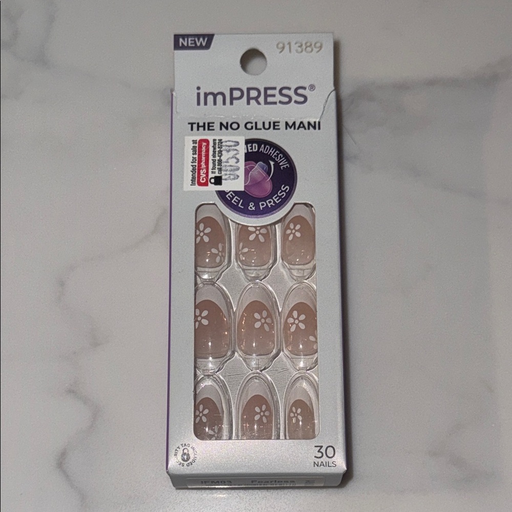 Kiss Nude Press-On Nails with White Floral Accents